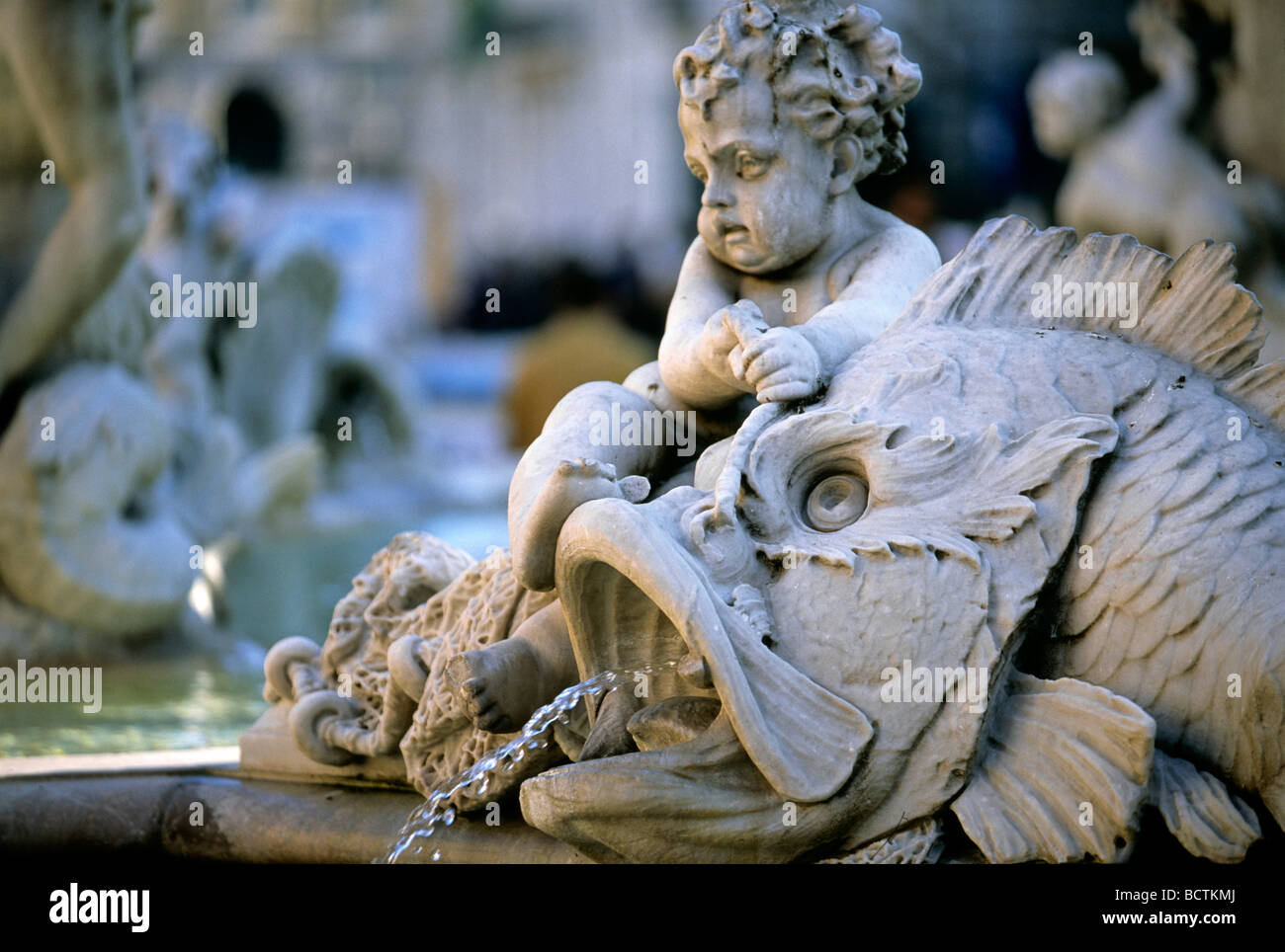 Fountain sculpture, fish with cherub, Neptune Fountain, Piazza Navona