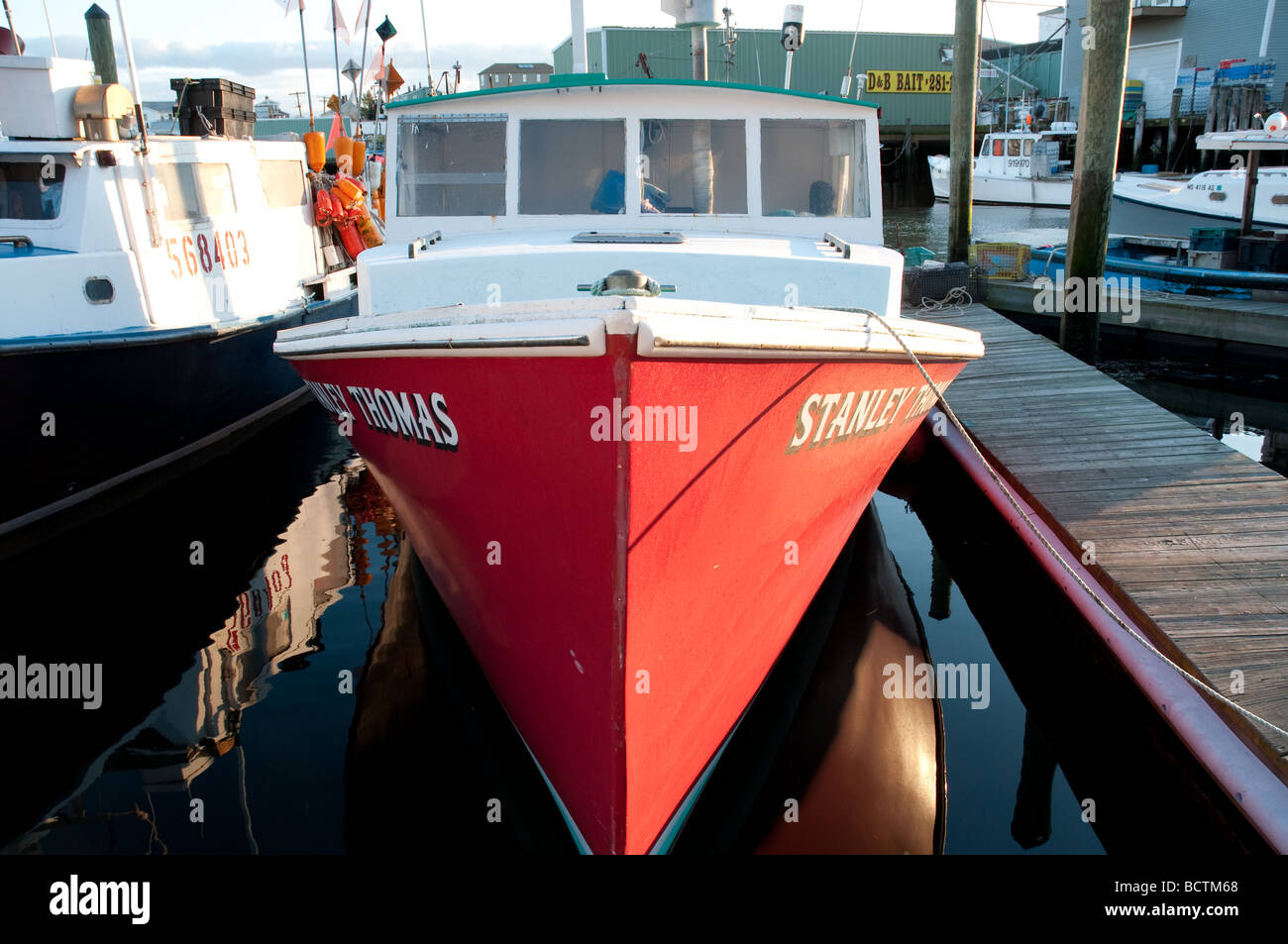 Red lobster boat in Gloucester Harbor Massachusetts Stock Photo Alamy