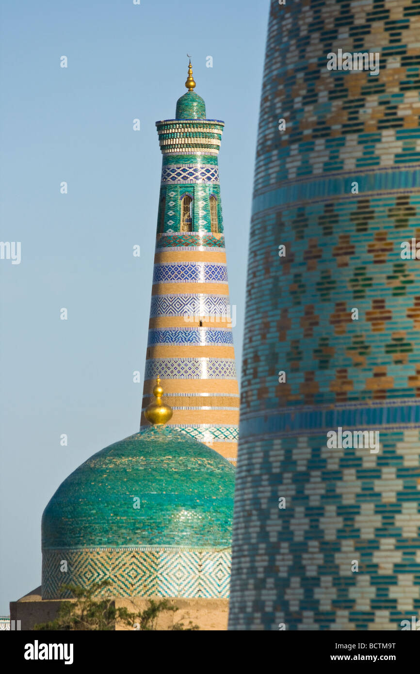 Minaret of Islam Khodja and and Kalta Minaret in Khiva Uzbekistan Stock Photo