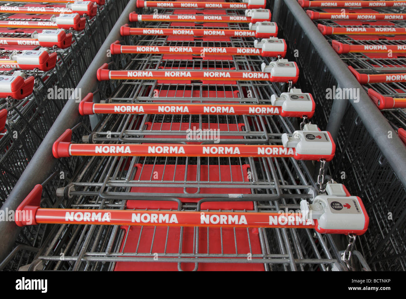 handles of Norma shopping carts in Germany, Europe. Photo by Willy Matheisl Stock Photo
