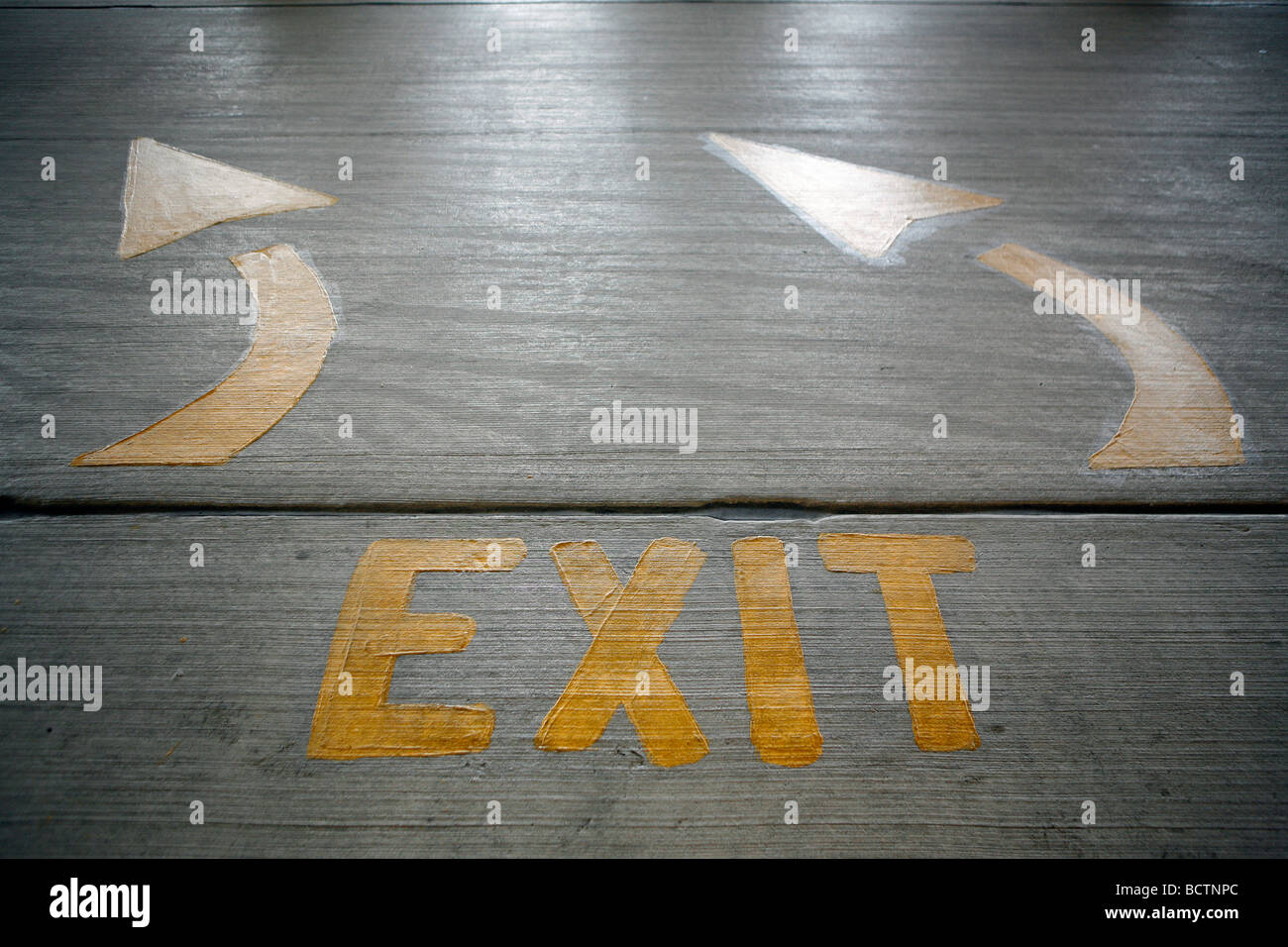 exit sign arrows parking garage Stock Photo