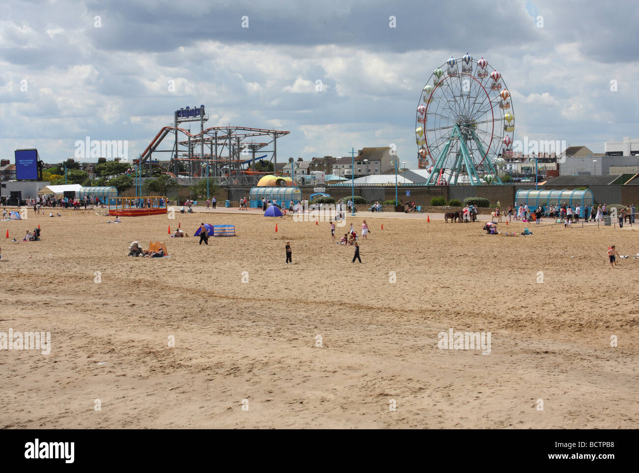 The beach and funfair at Skegness, Lincolnshire, England, U.K. Stock Photo