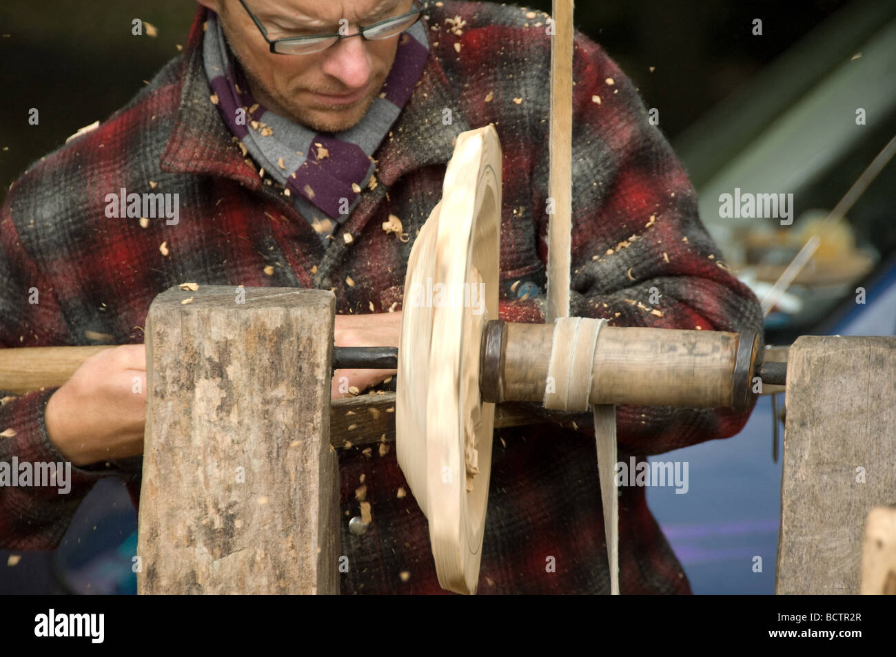 Traditional woodturner demonstrating at woodcraft fair Stock Photo