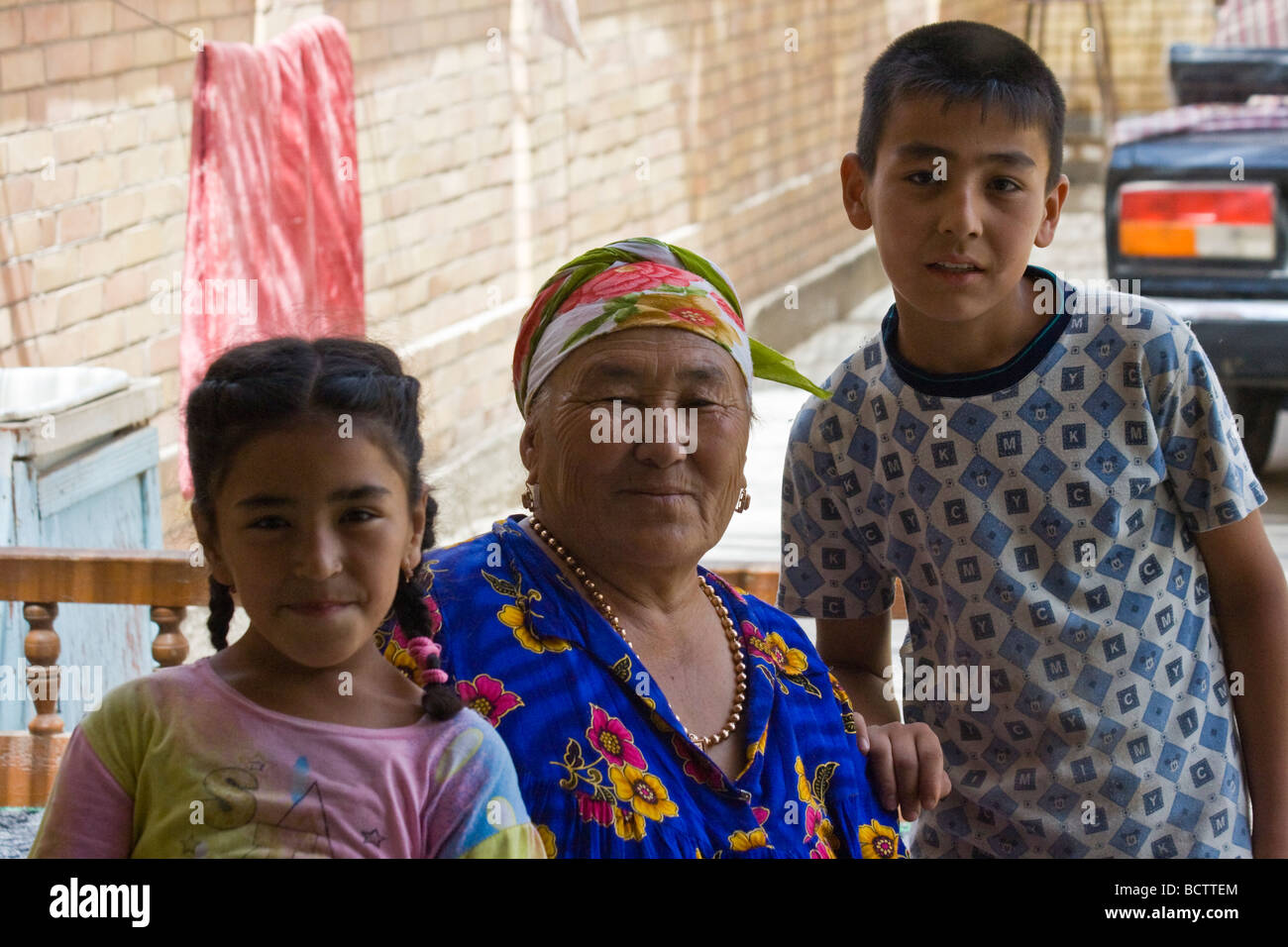 Grandmother and Children in Turkmenabat or Charjou Turkmenistan Stock Photo