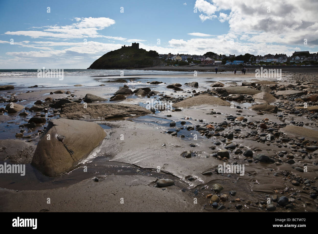 Criccieth beach and castle, Gwynedd, Wales Stock Photo