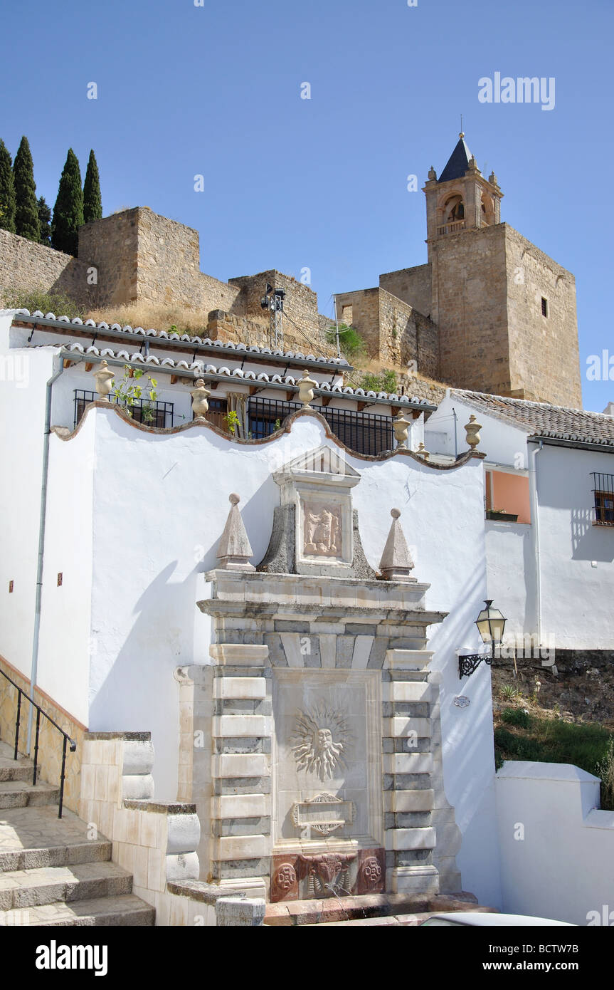 Ornate fountain and Moorish Castle, Antequera, Malaga Province, Andalusia, Spain Stock Photo