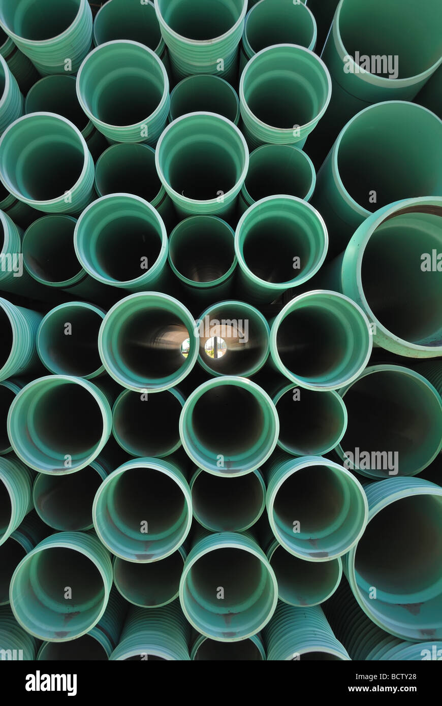 Stacked PVC piping Stock Photo Alamy