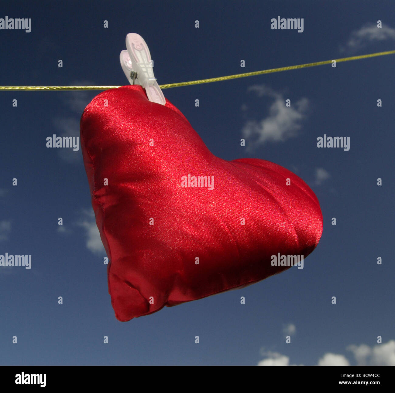 Heart shape on a washing line. Concept depicting washing out emotions