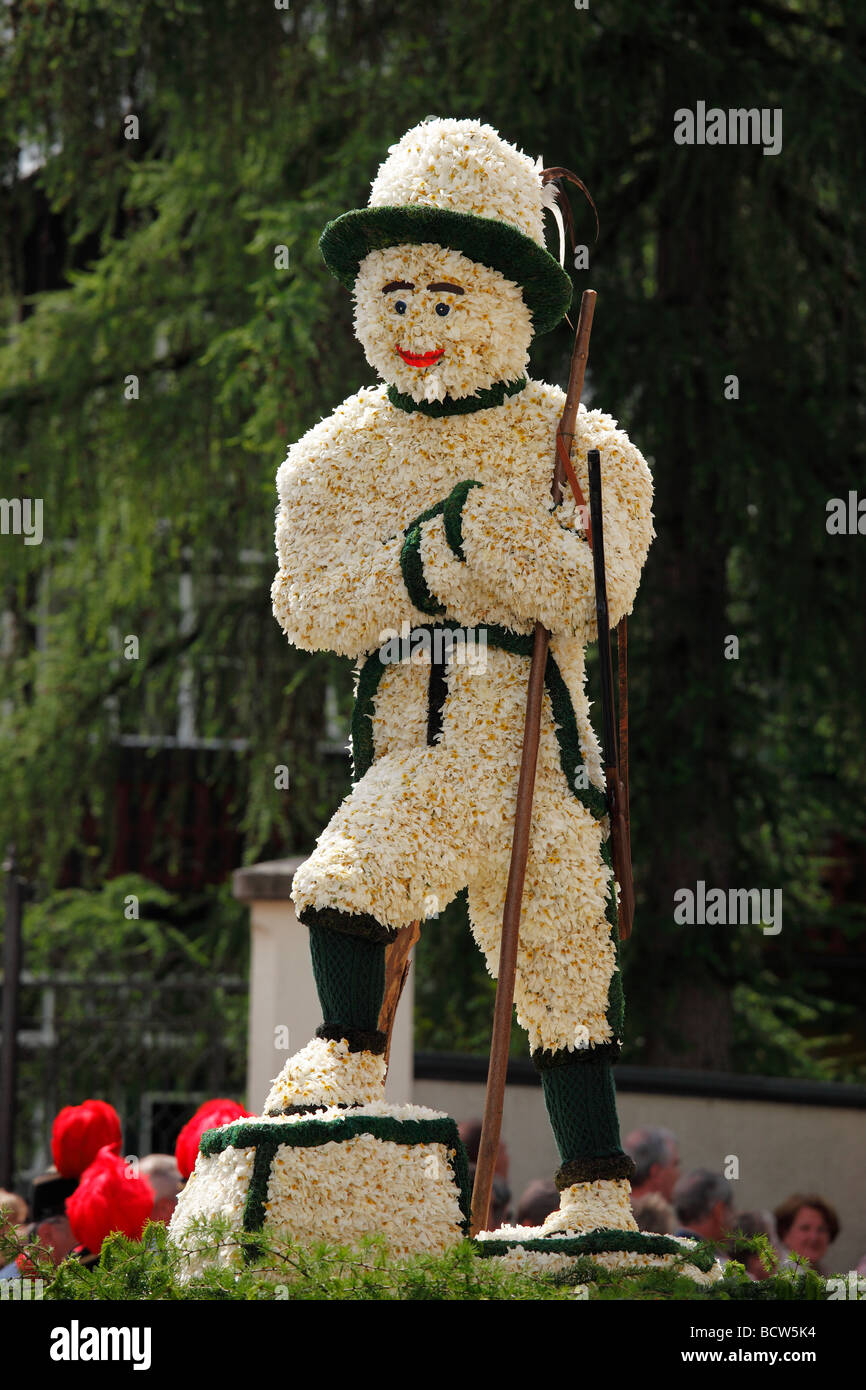 Hunter figure made of daffodils, Narcissus Festival in Bad Aussee, Ausseer Land, Salzkammergut area, Styria, Austria, Europe Stock Photo