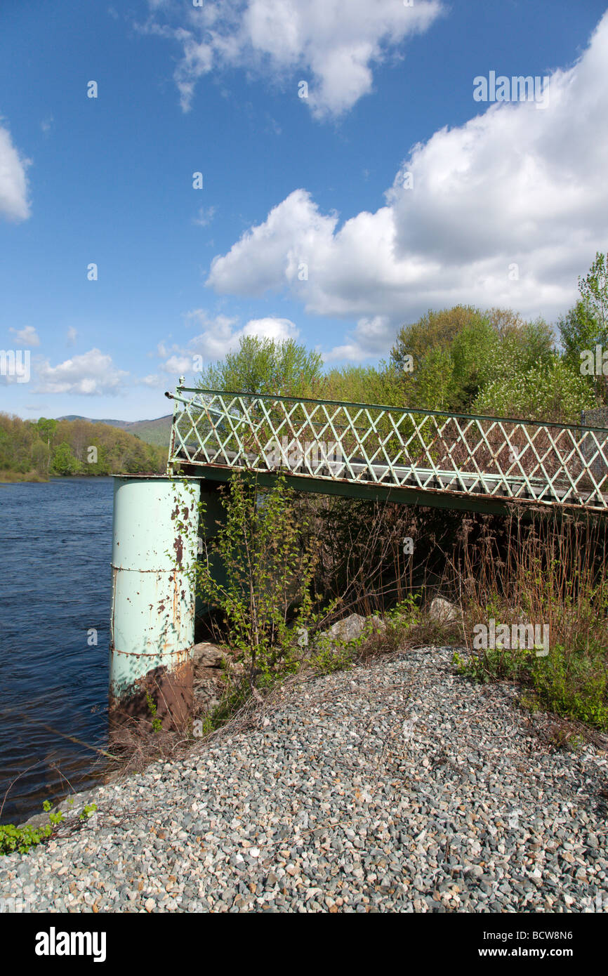 Old Meadows Bridge on the side of the Androscoggin River in Shelburne