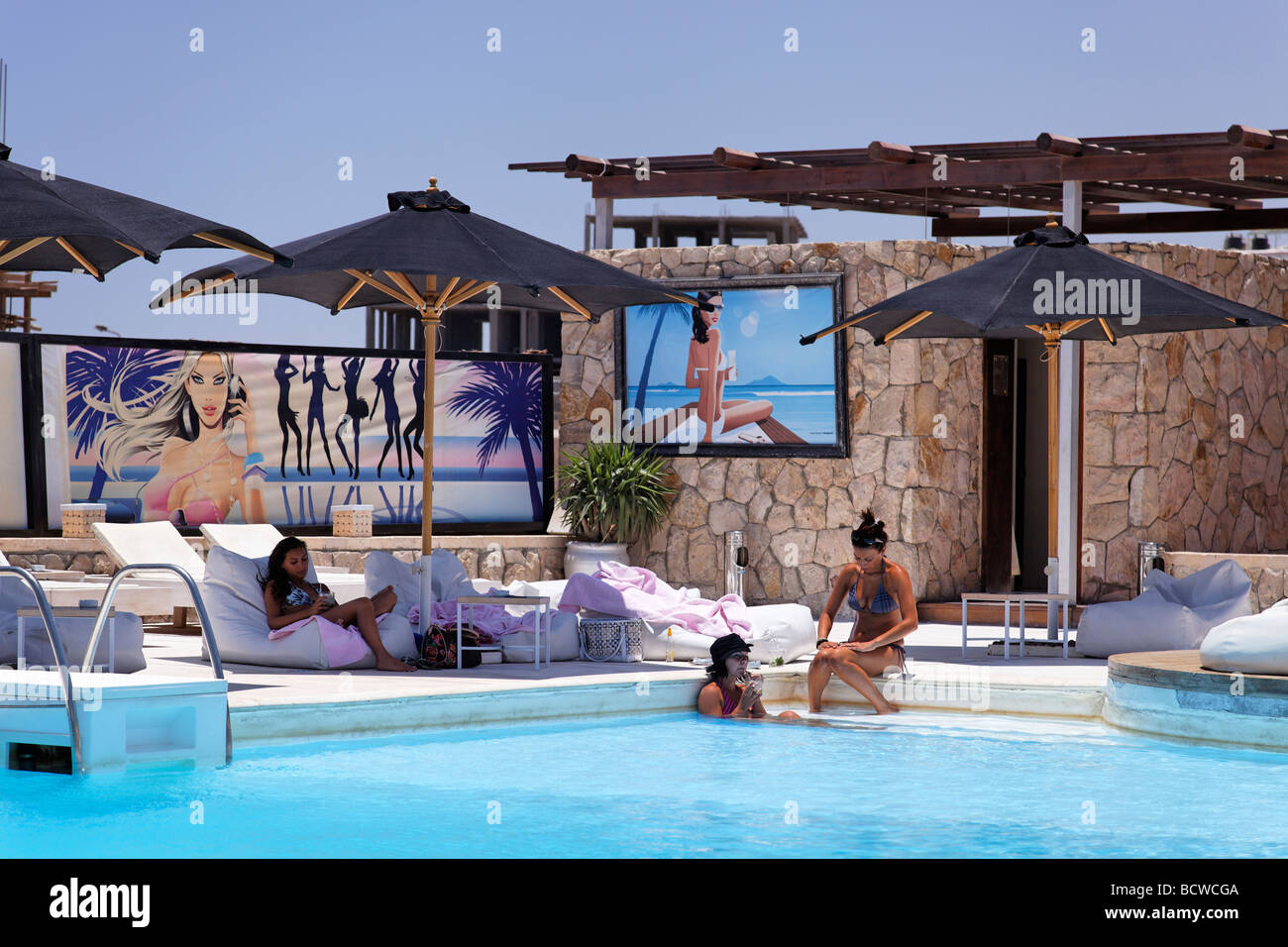 Women, discotheque with pool and bar, Hedkandi Beach Bar, parasols, marina, Hurghada, Egypt, Red Sea, Africa Stock Photo