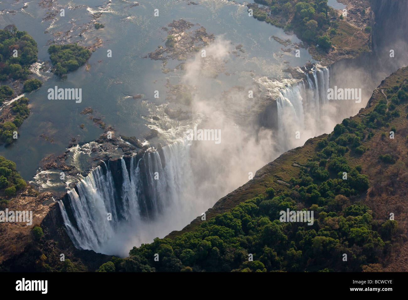 Helicopter flying above Victoria Falls, Zambia, Zimbabwe, Africa Stock Photo