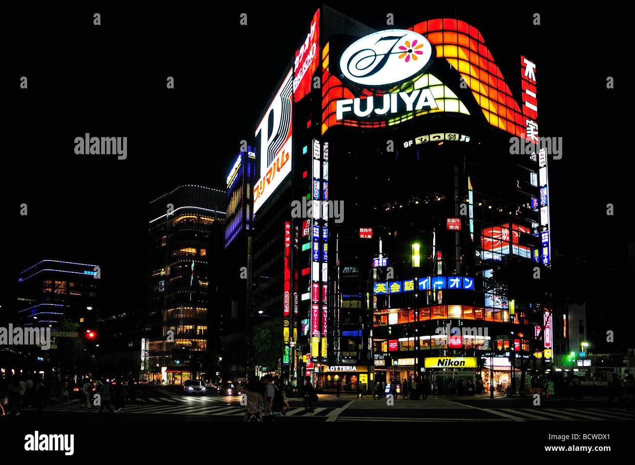 Colourful shop fronts and advertisements screens in Ginza district Tokyo Japan Stock Photo