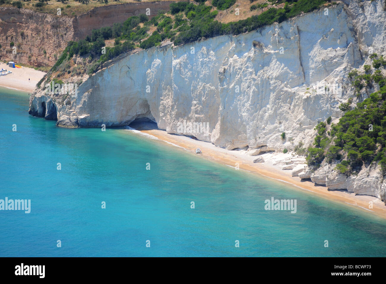 Europe Italy Puglia Region white cliffs and blue sea near Vieste Gargano Mountains Stock Photo