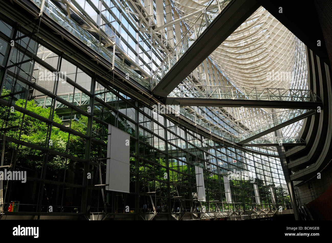 Curves of steel truss and glass of the Tokyo International Forum designed by architect Rafael Vinoly located in Marunouchi district Tokyo Japan Stock Photo