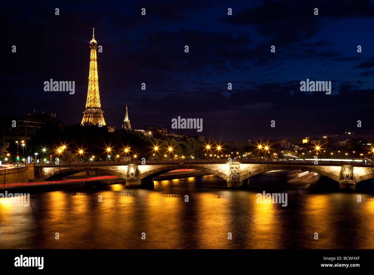 Eiffel Tower, River Seine at dusk from Pont Alexandre III, Paris France