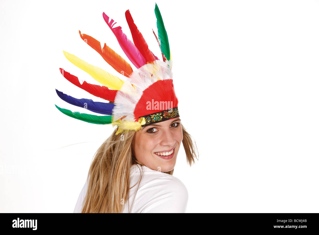 Young woman with carnival headdress, Indian feathers Stock Photo