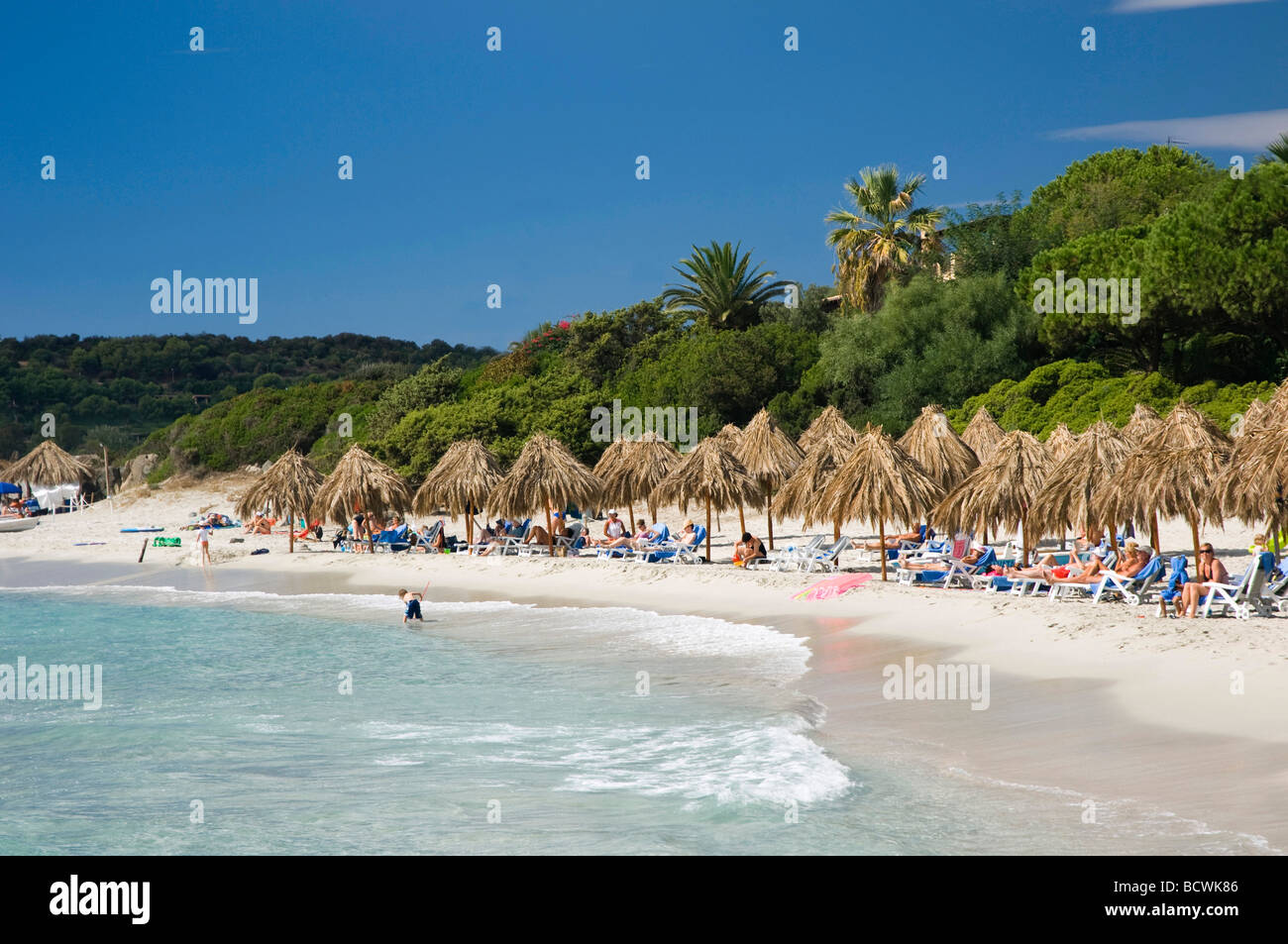Sandy beach, parasols, Simius Playa, Villasimius, Sardinia, Italy, Europe Stock Photo