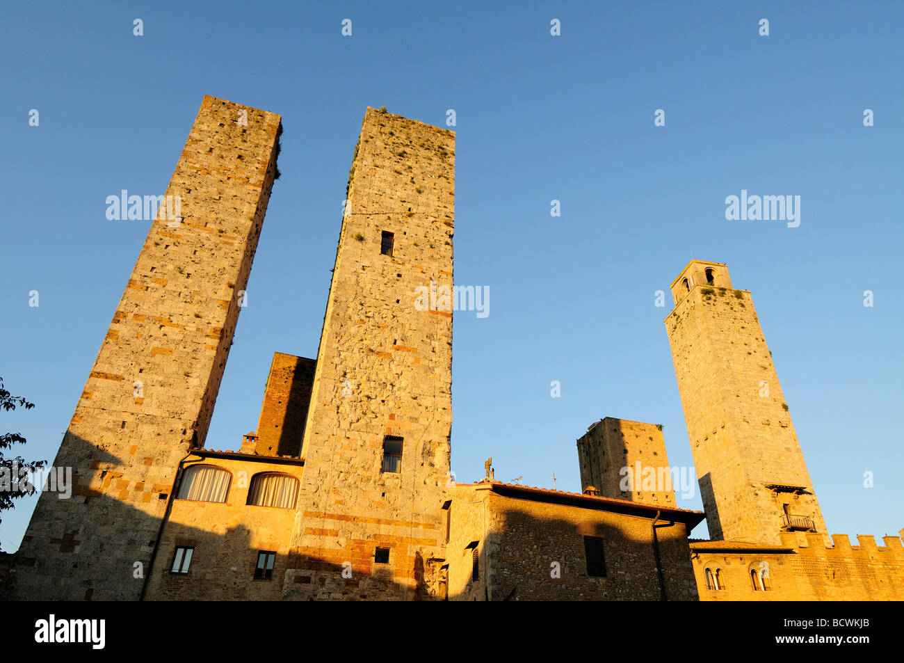Medieval towers in Piazza del Duomo, San Gimignano, Tuscany, Italy ...