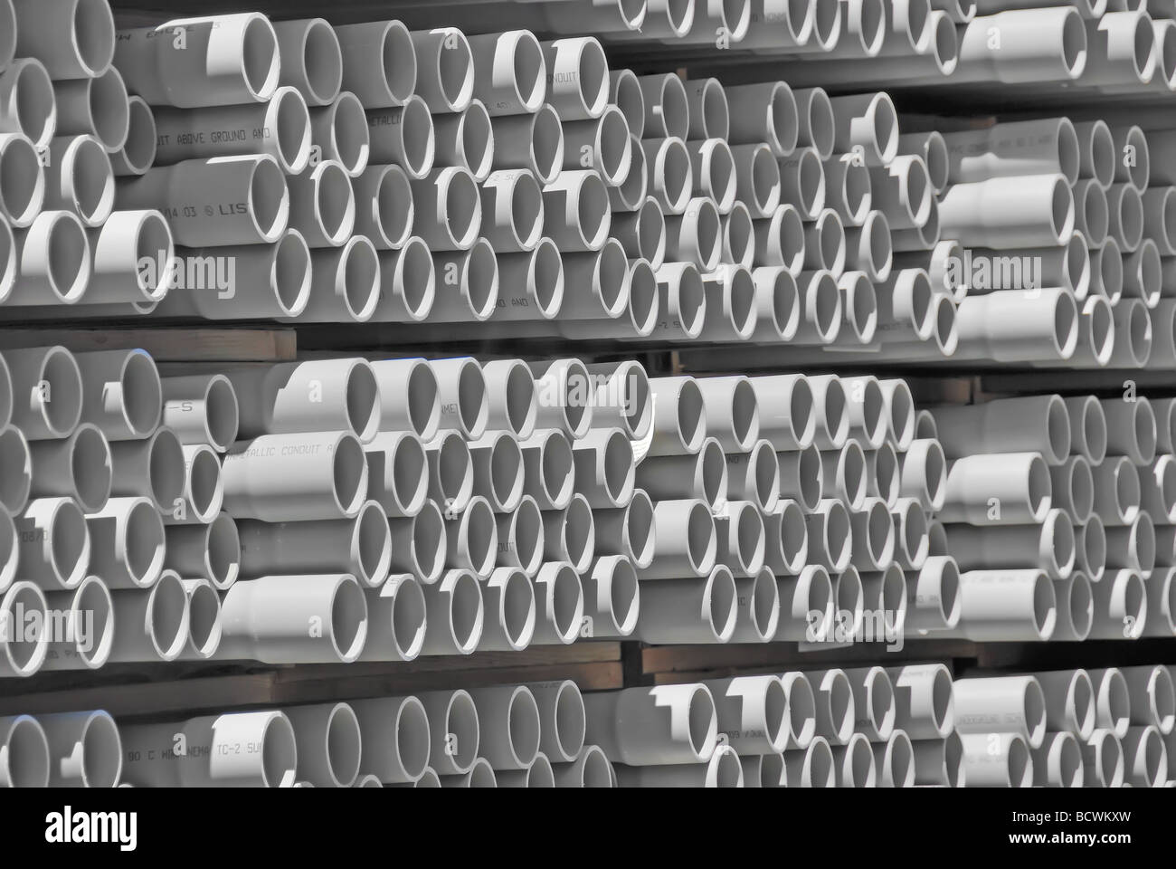 Stacked PVC piping Stock Photo Alamy