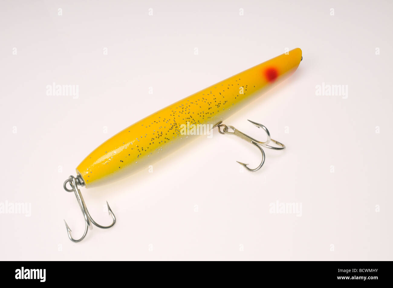Fishing lure for saltwater with treble hooks Stock Photo - Alamy