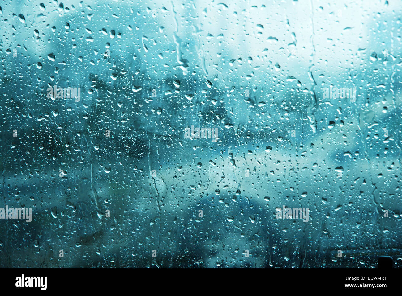steamed up car window showing a blue car Stock Photo Alamy