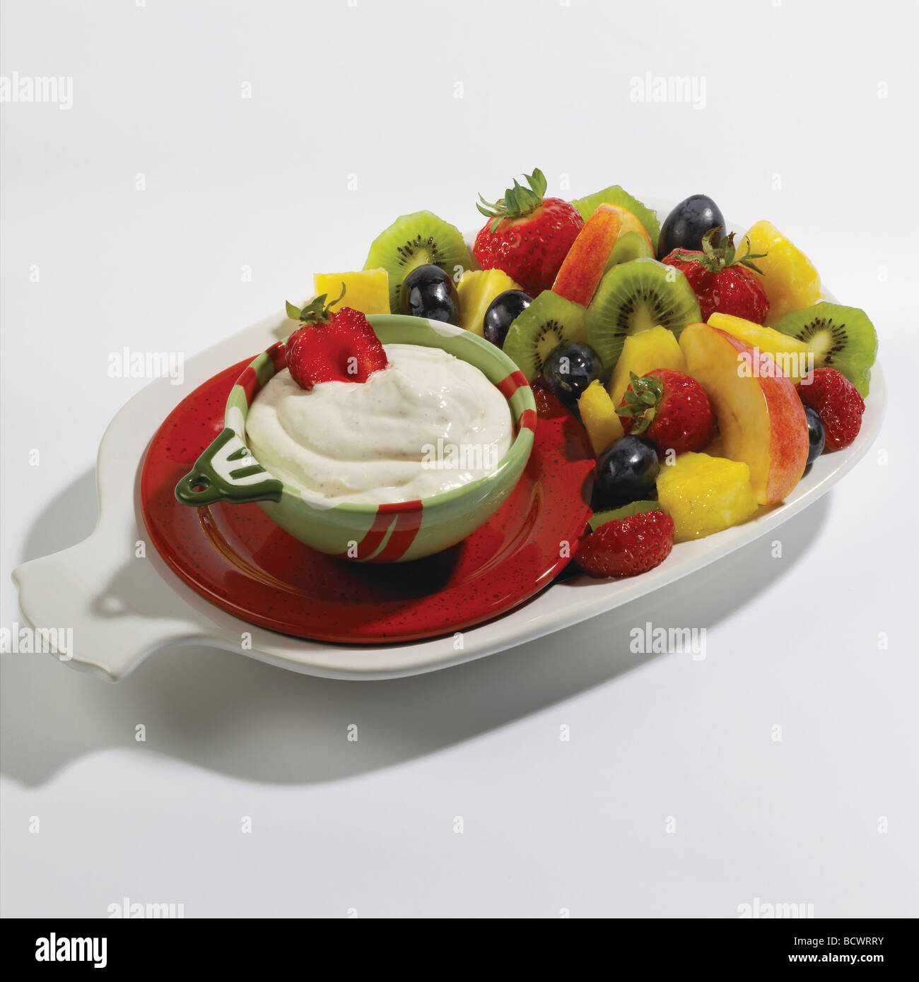 Fruit salad plate platter with dip Stock Photo Alamy