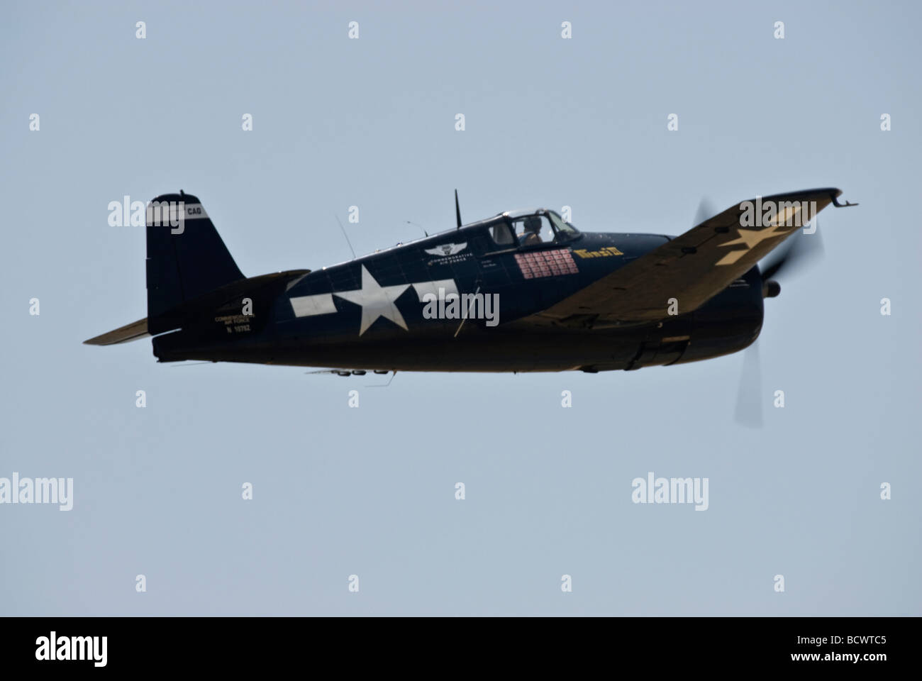 A Grumman F6F Hellcat flies at an air show. Stock Photo