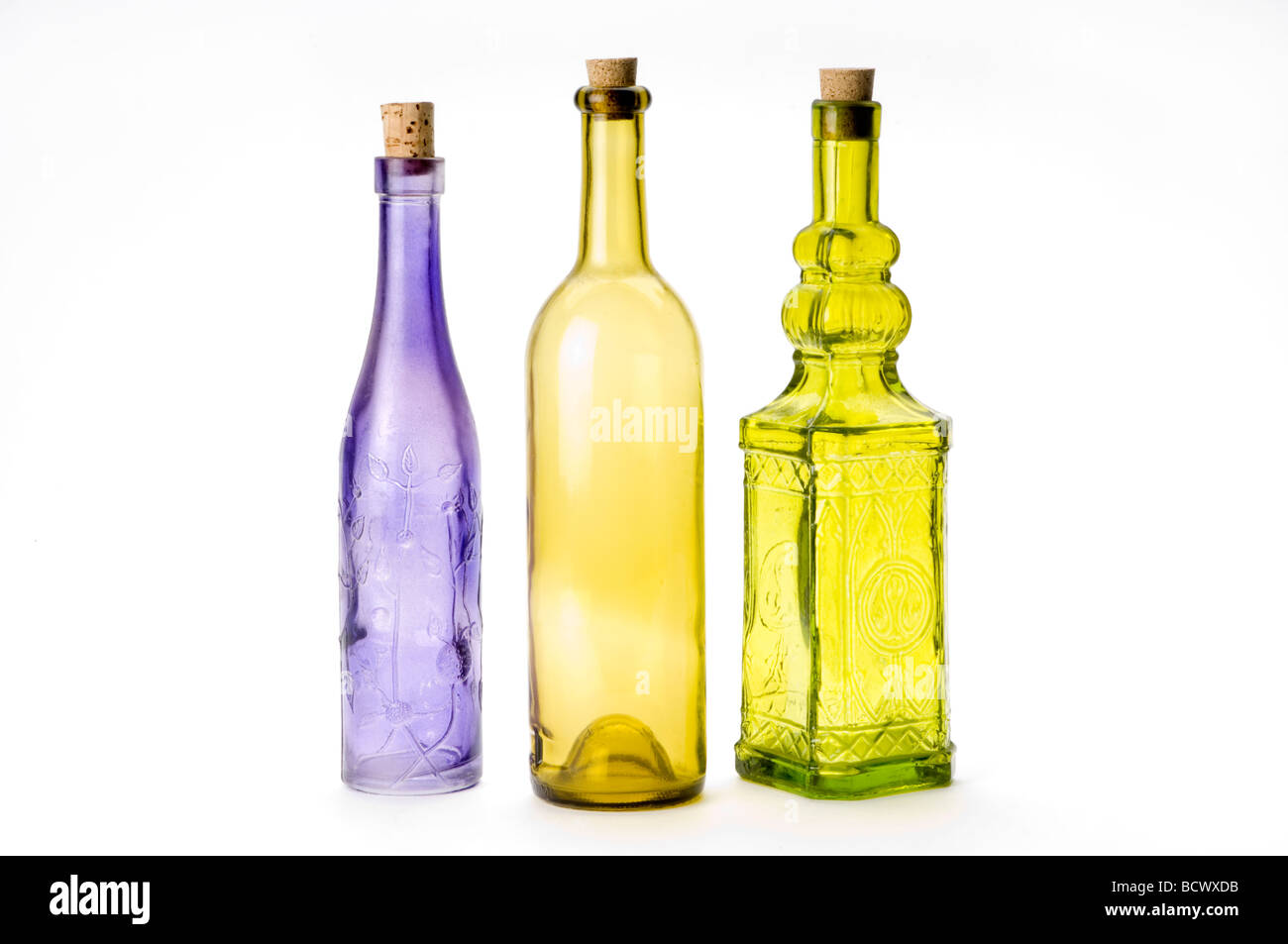 colorful glass bottles on white Stock Photo