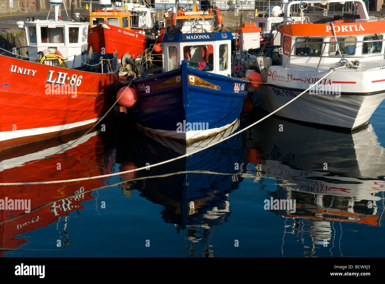 fishing boats in the harbour at Seahouses, Northumberland, UK Stock ...