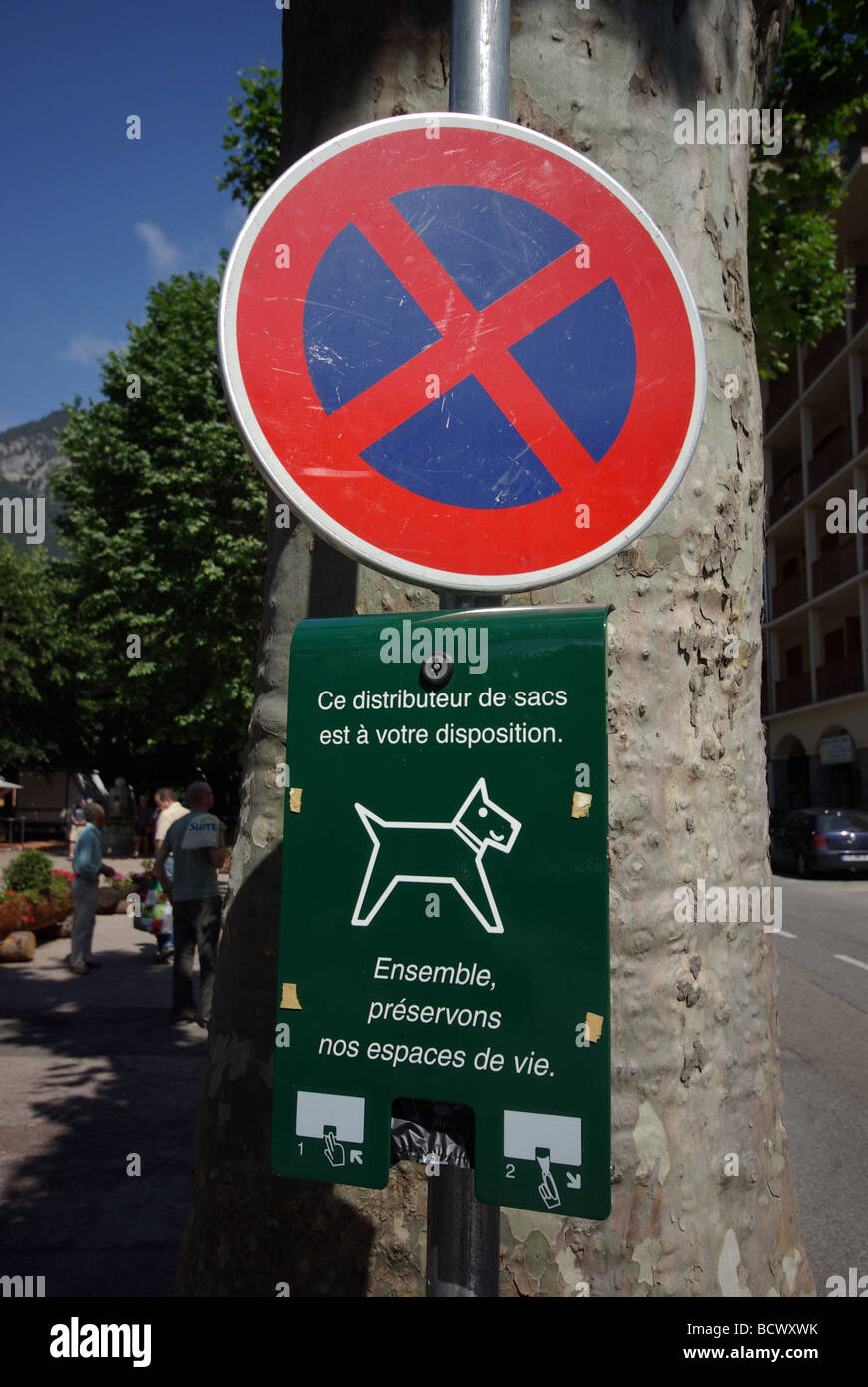 Dog fouling bag dispenser in the village of St. Martin-Vesubie, France Stock Photo