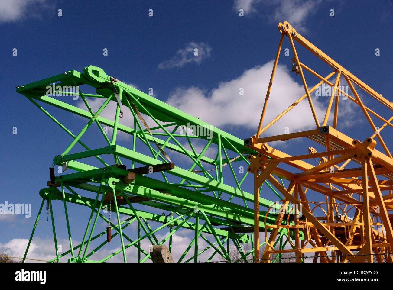 Sections of crane in a crane yard Stock Photo Alamy