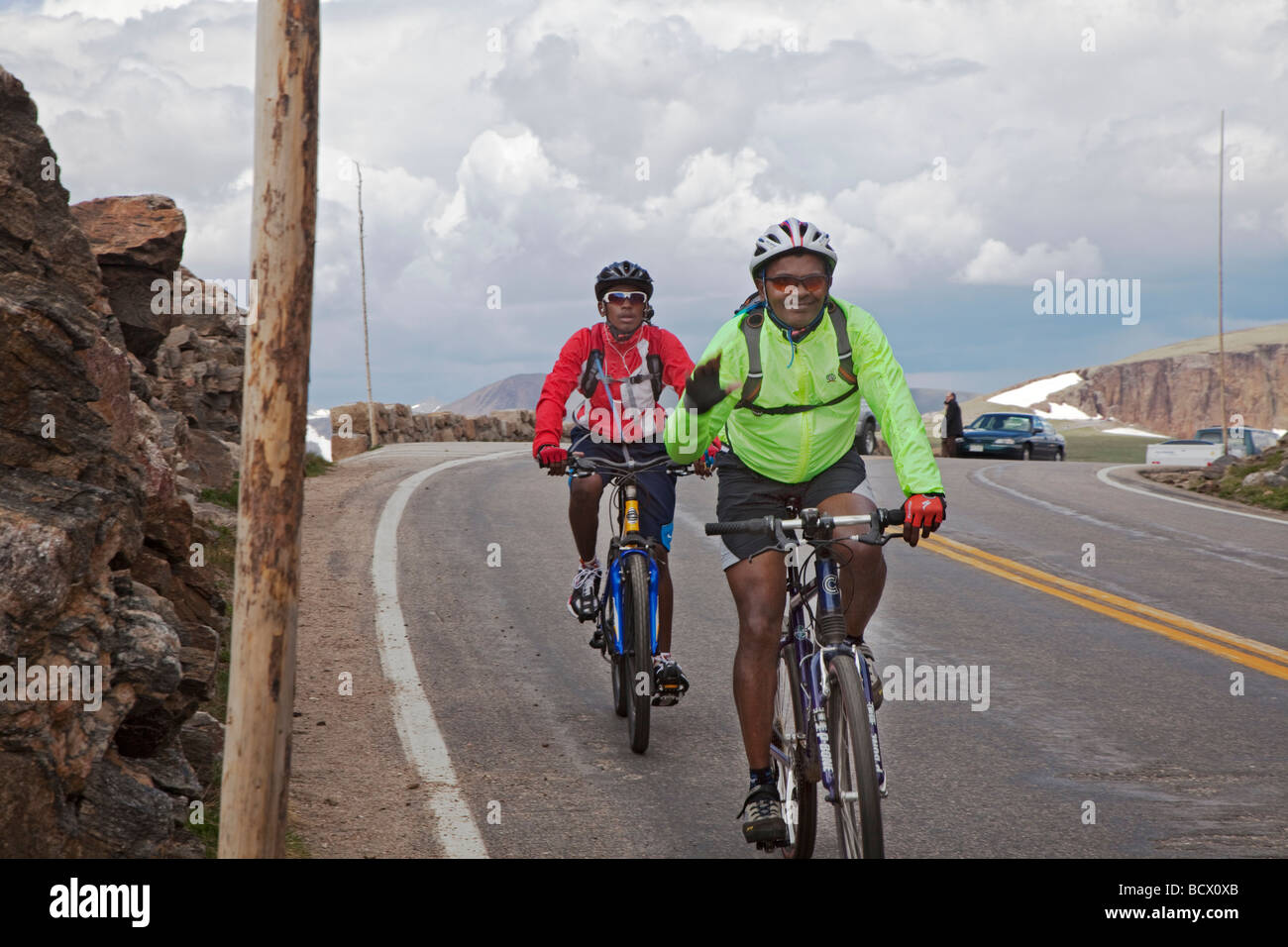 Bicycle Riders on Trail Ridge Road in Rocky Mountain National Park Stock Photo
