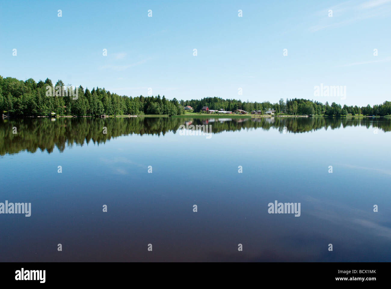 Calm lake and blue sky Stock Photo