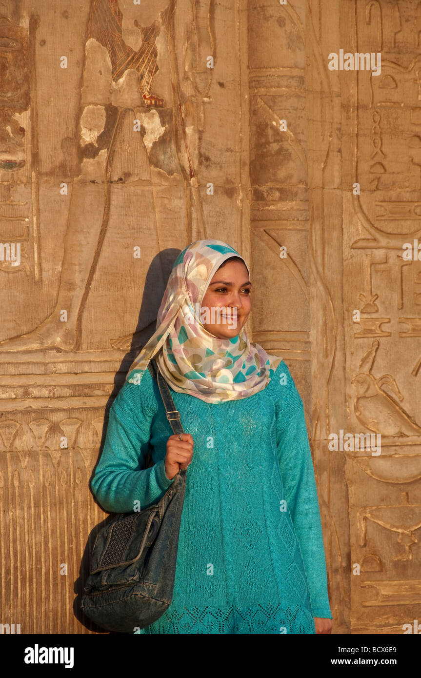 Egypt Kom Ombo Young woman green dress scarf muslim attire egypt kom ombo temple Stock Photo