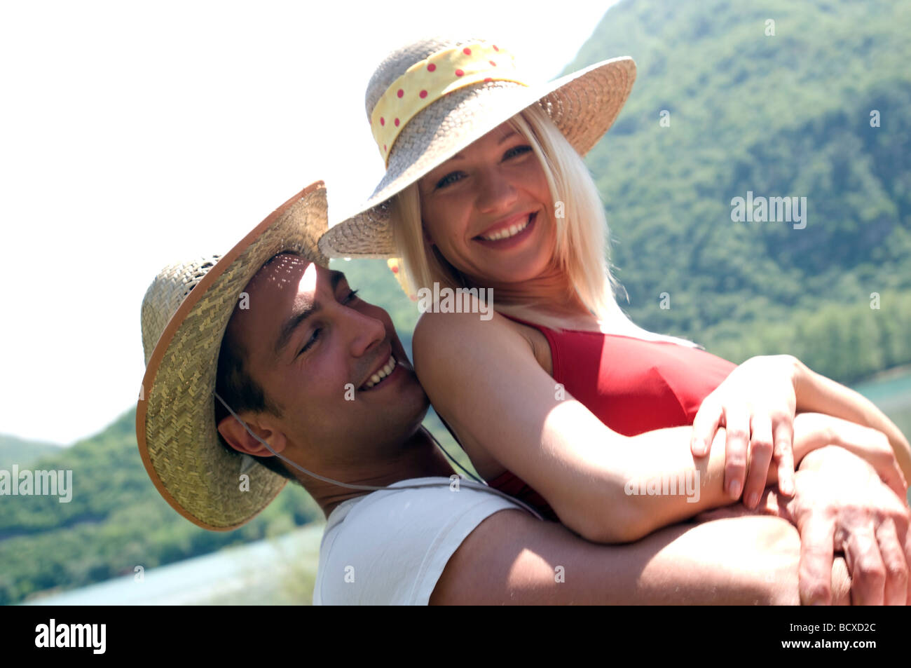 Man wearing two straw hats hi-res stock photography and images - Alamy