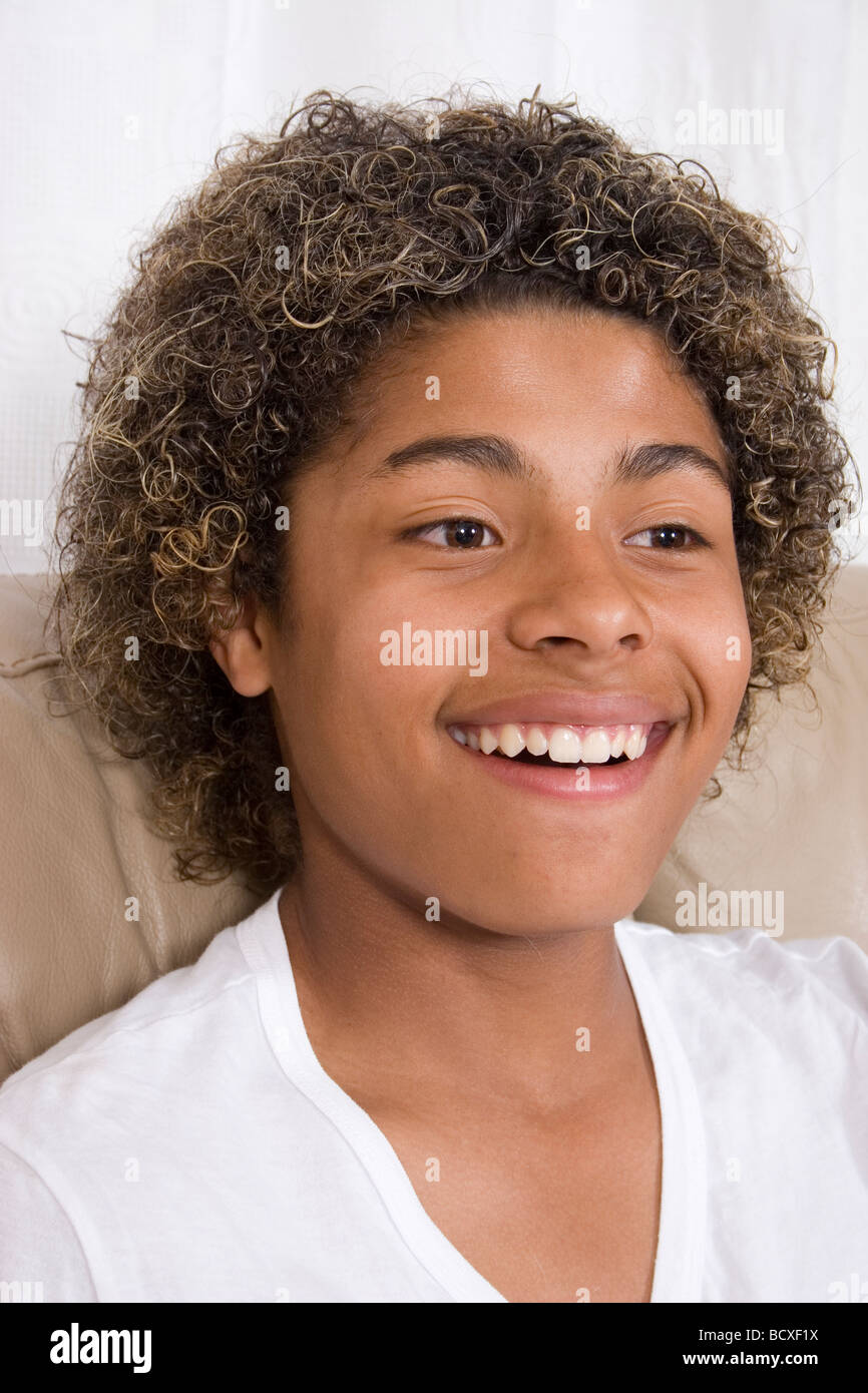 portrait mixed race black teenage boy with afro hairstyle Stock Photo -  Alamy