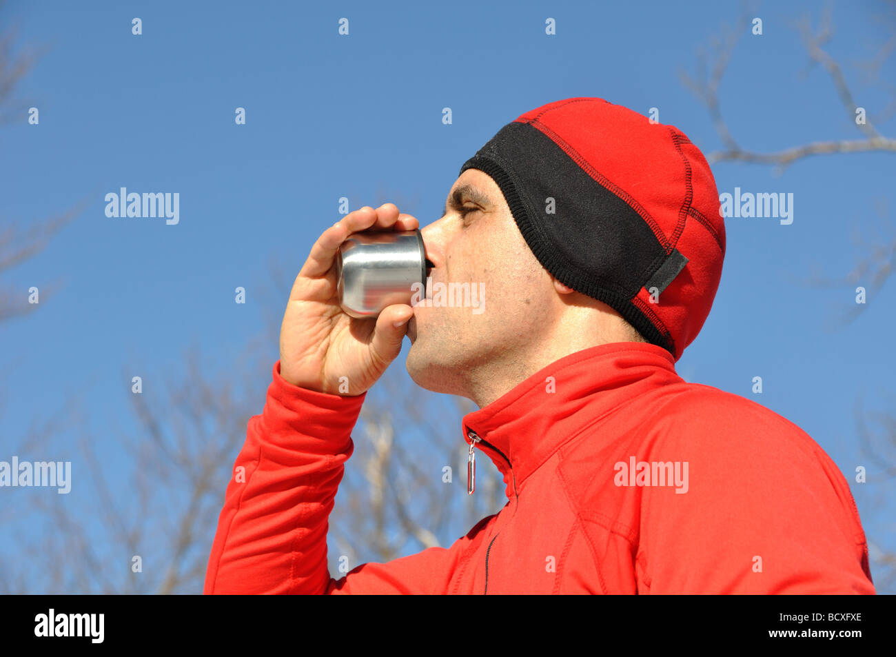 Caffe mug and heat sealing thermos cover made of stainless steel on thee  rock by taking photo during trekking in wild nature in forest Stock Photo -  Alamy