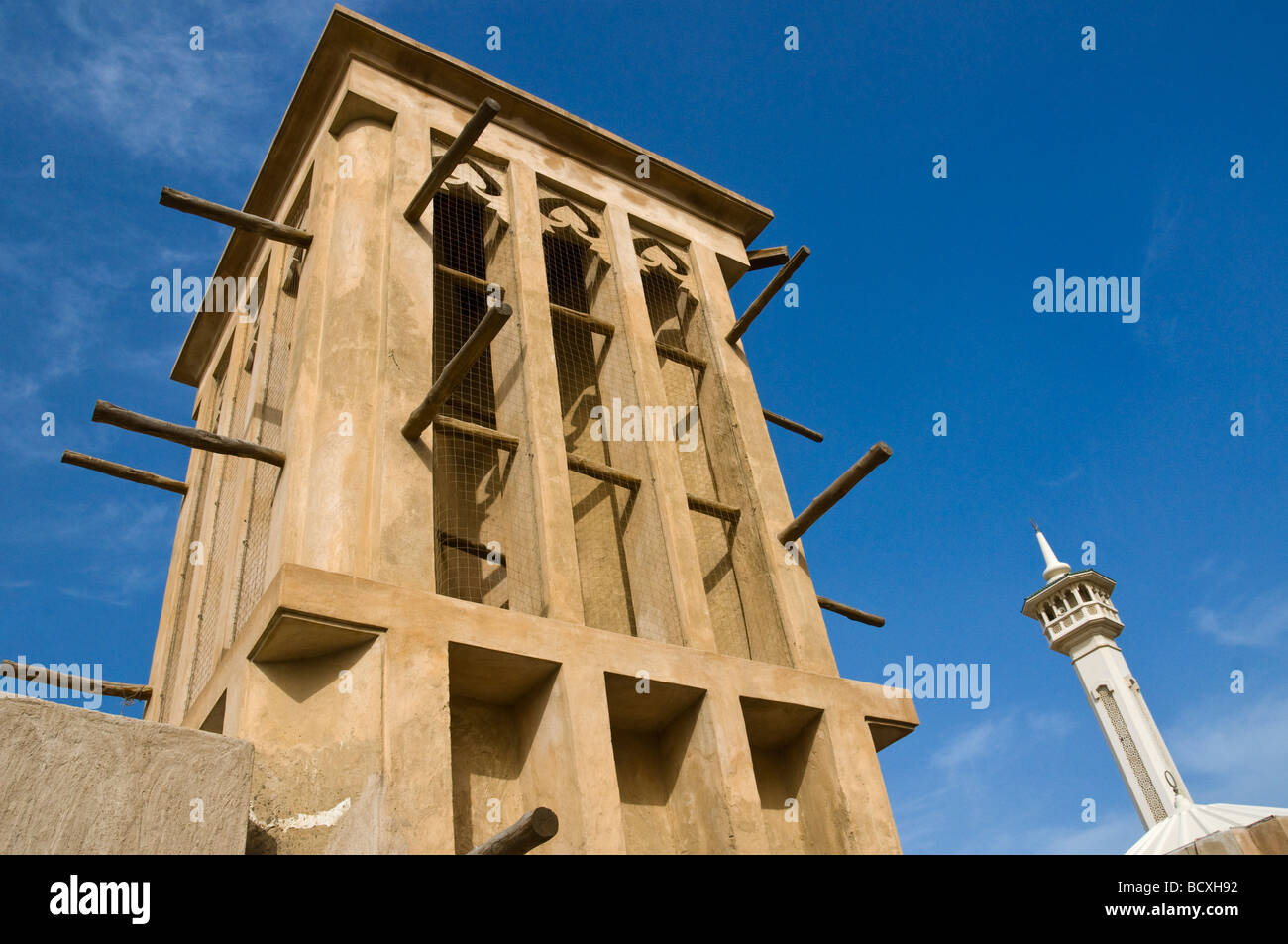 Traditional wind towers in the historical district of Bastakia  Bur Dubai, Dubai Stock Photo