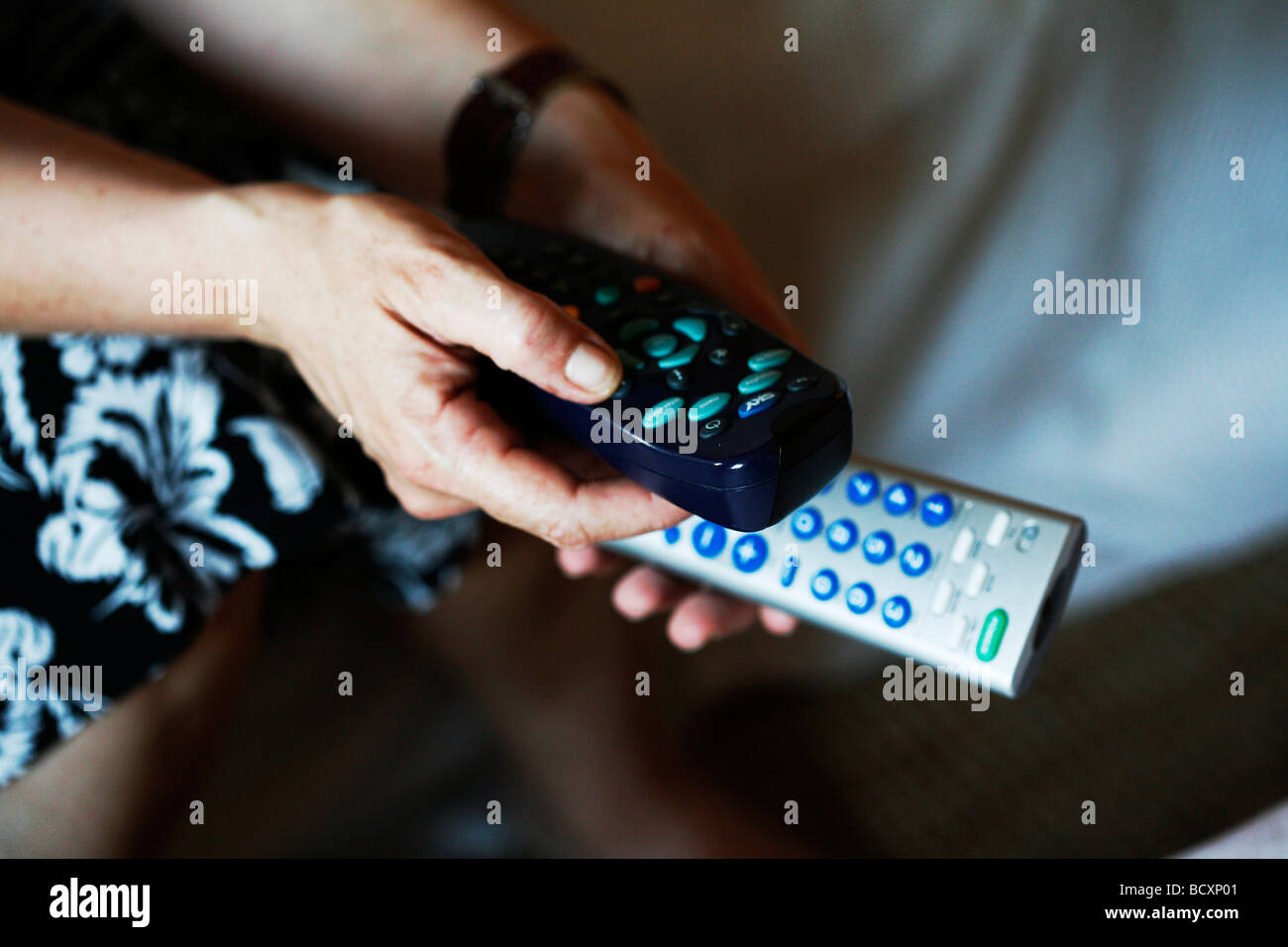 hands with remote control Stock Photo Alamy
