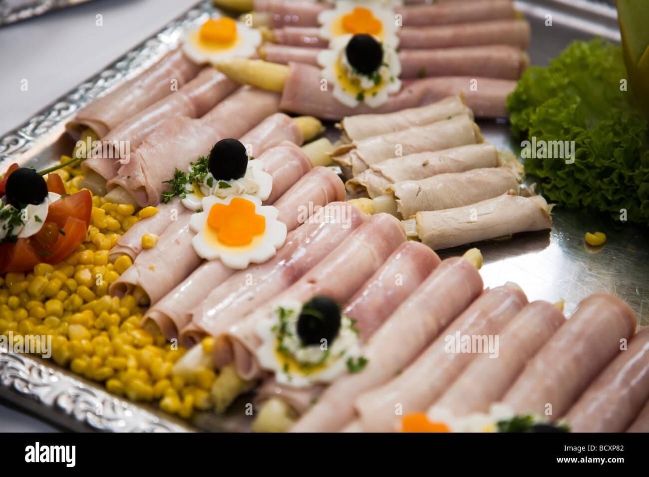 Ham asparagus rolls as starter with maize Stock Photo Alamy