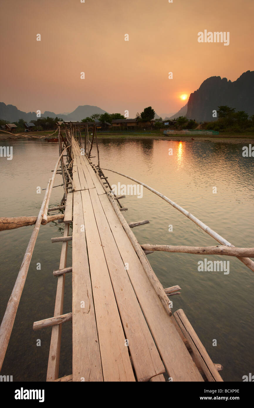 sunset at the bridge over the Nam Song River at Vang Vieng, Laos Stock Photo