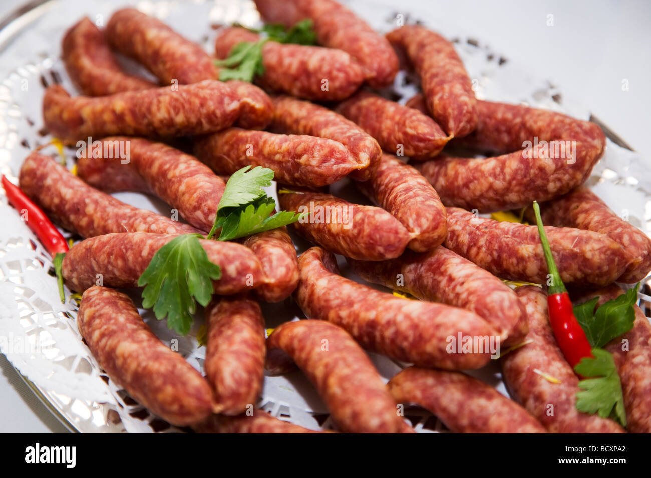 Starter with smoked sausage containing minced pork Stock Photo