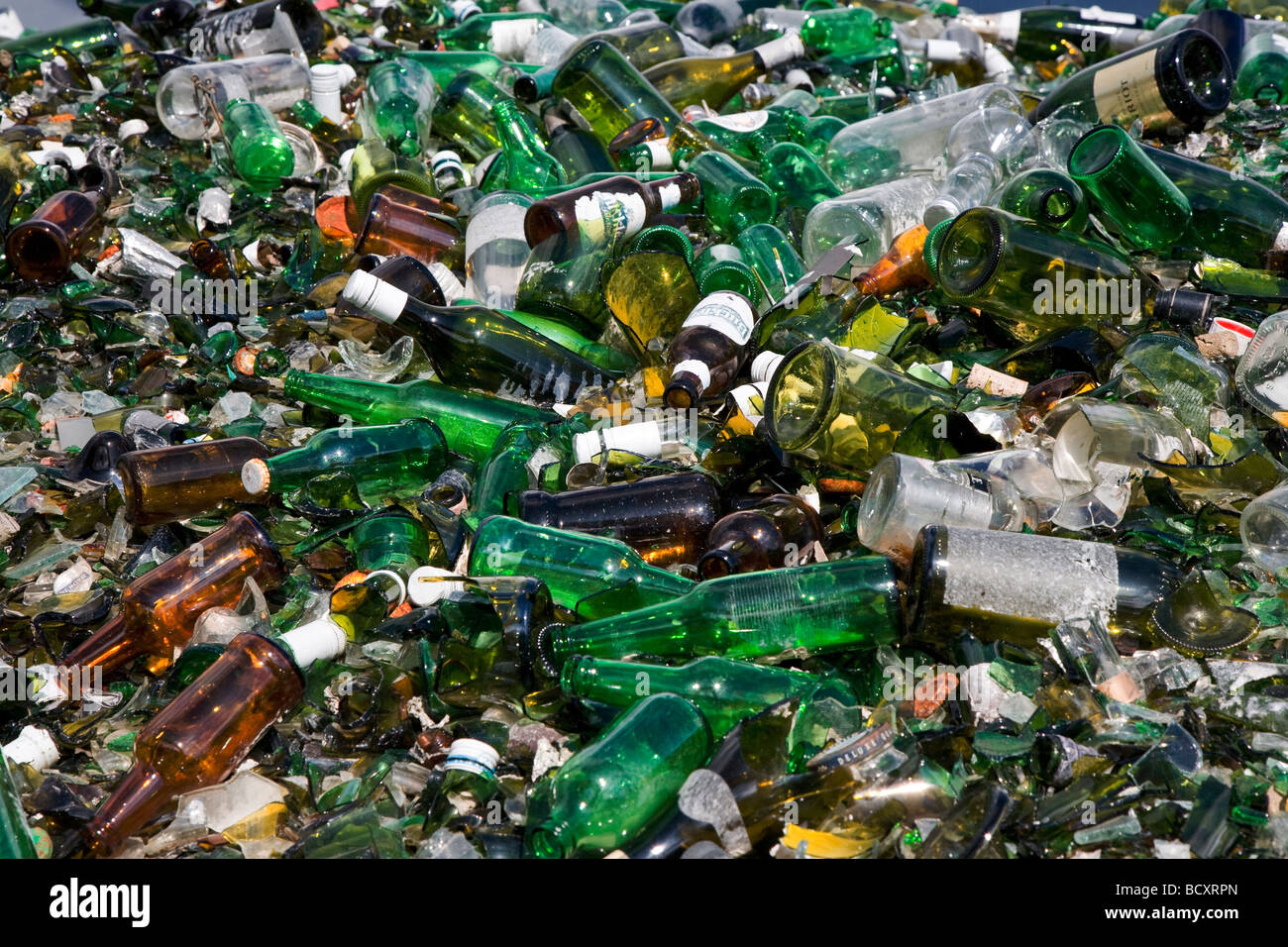 Bottles broken in public recycling materials Stock Photo Alamy
