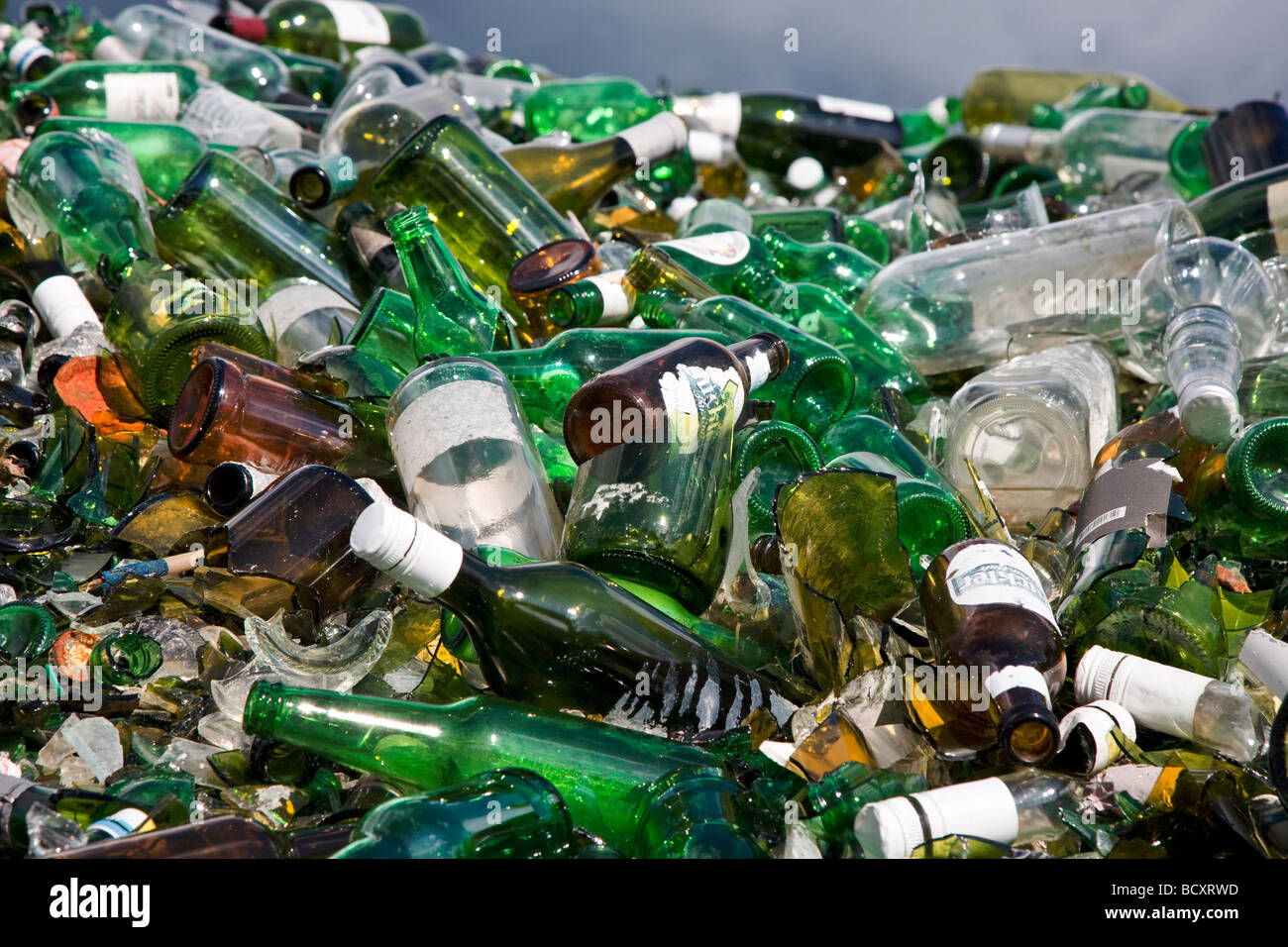 Bottles broken in public recycling materials Stock Photo Alamy