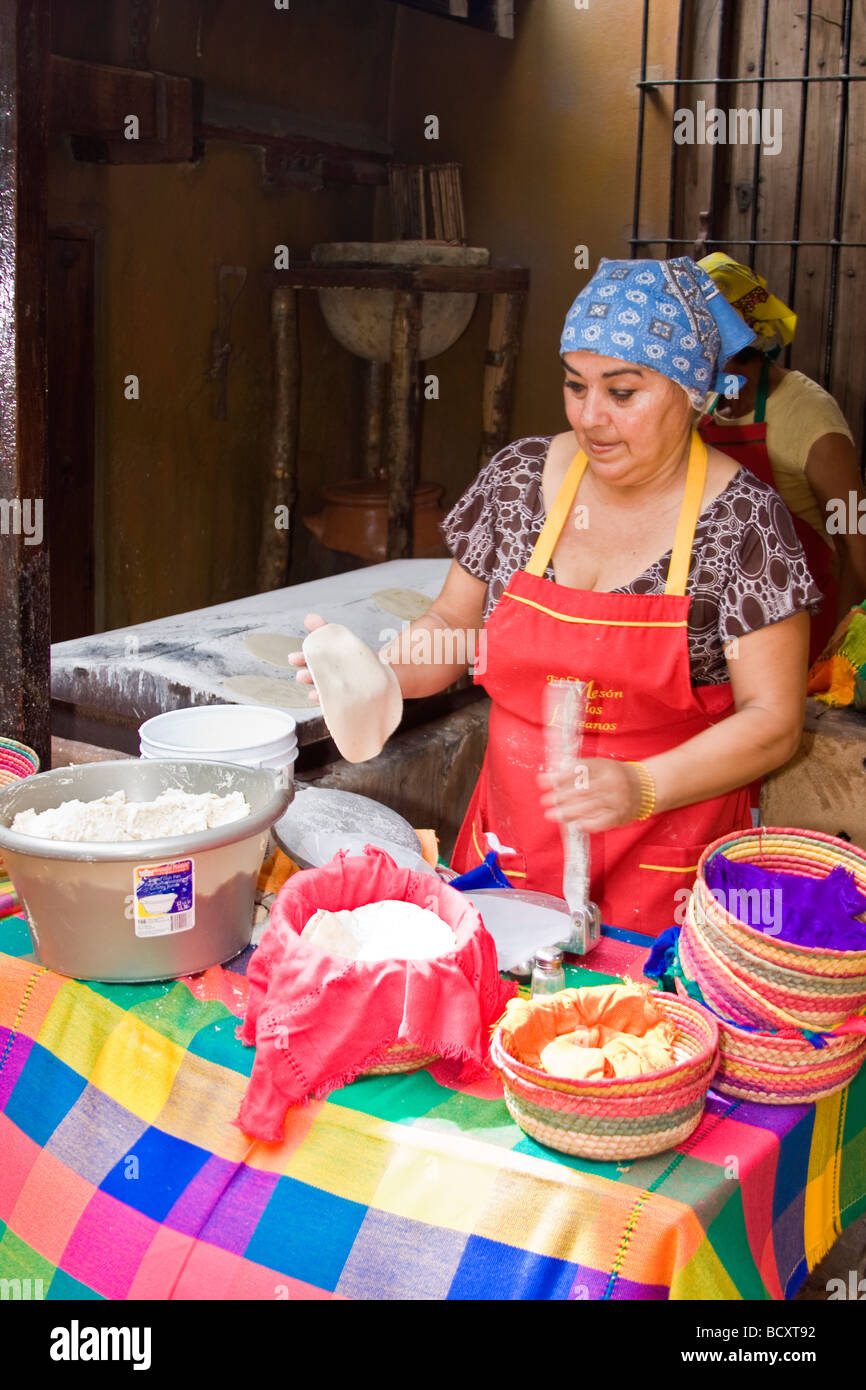 Local woman makes tortillas by hand in a restaurant in El Quelite, Mexico Stock Photo