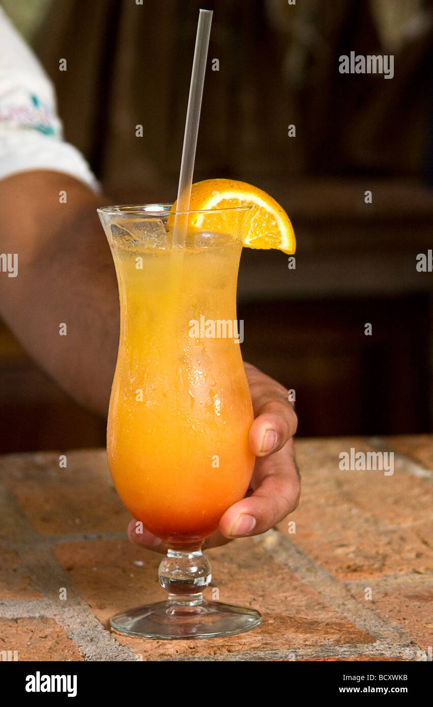 Tequila sunrise drink made with tequila type drink and blood red