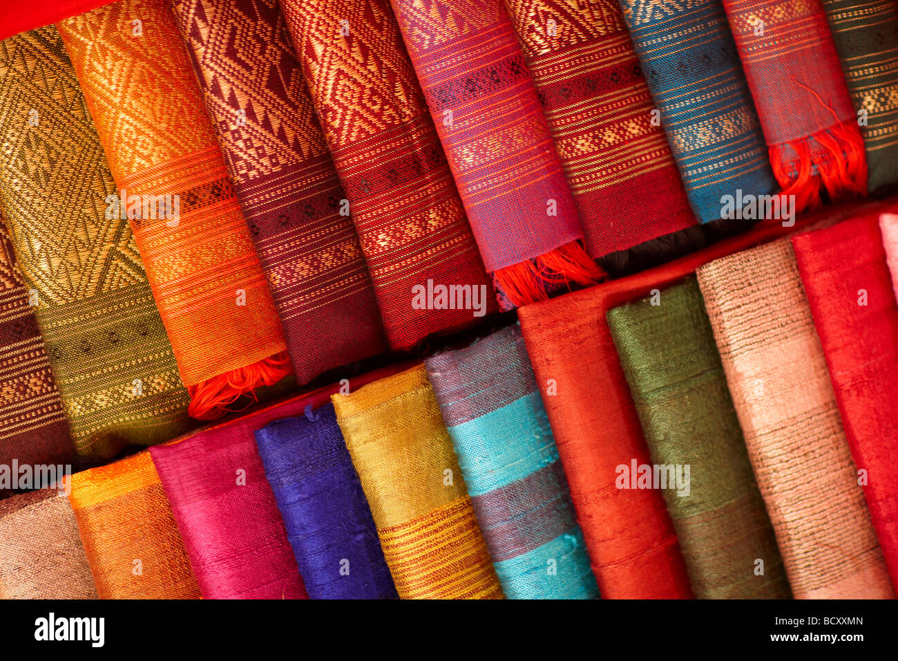 details of silk fabrics on sale in the Night Market, Luang Prabang, Laos Stock Photo
