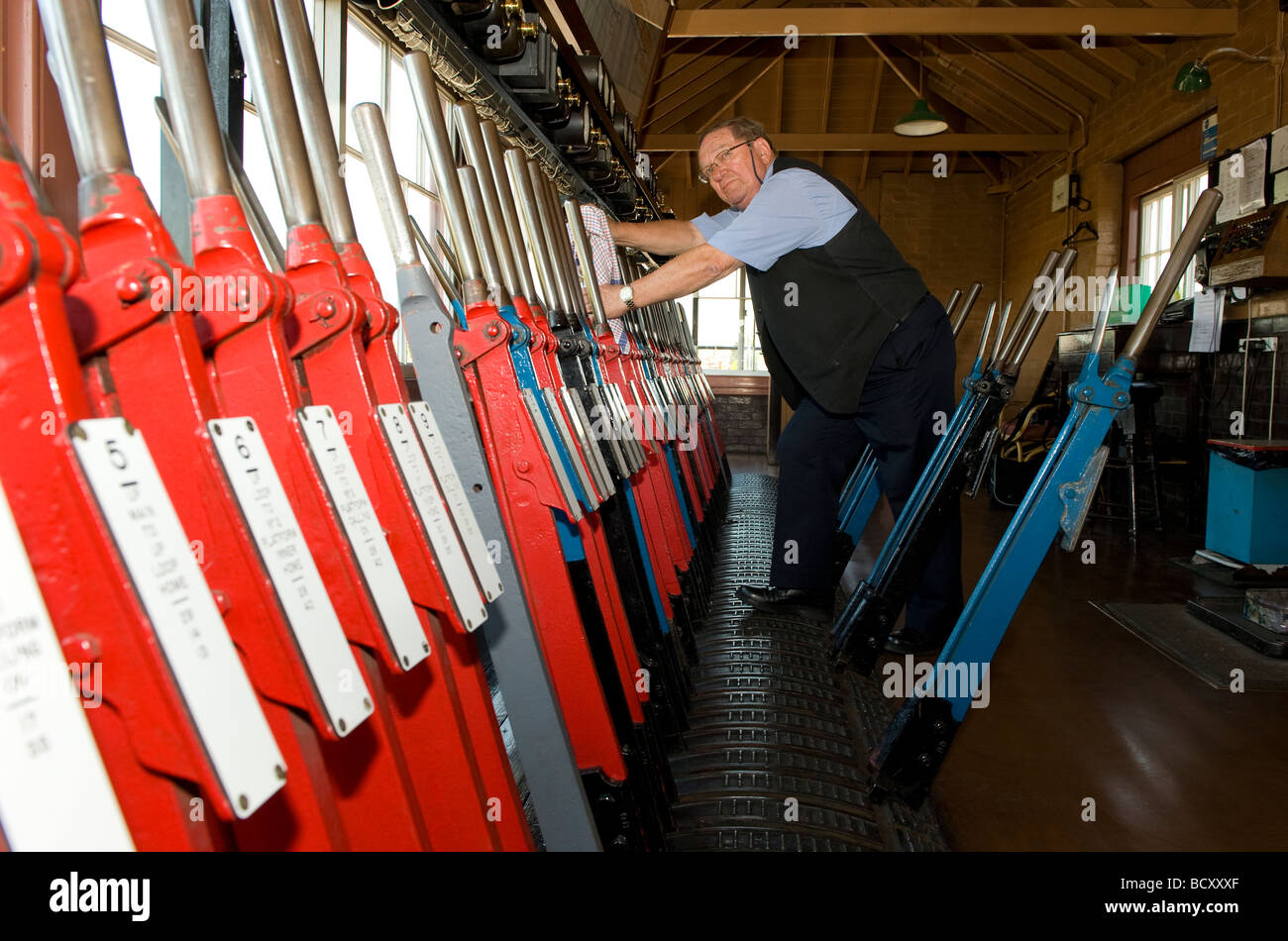The signalman in the signal box on the The Severn Valley Railway, Kidderminster station, Worcestershire Stock Photo