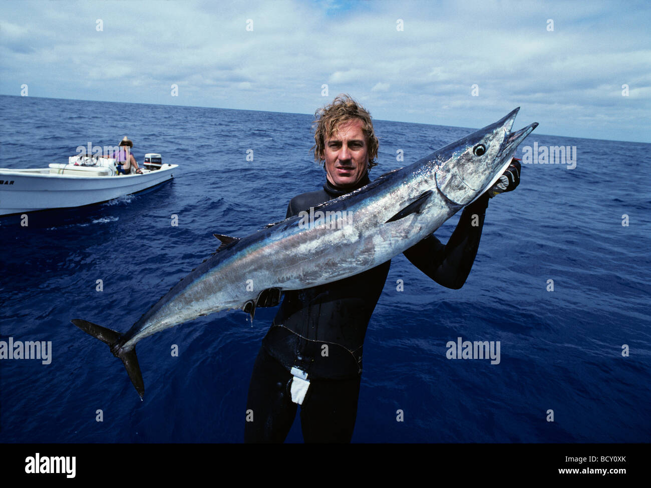 Bluewater Hunter holds giant Wahoo Acanthocybium solandri Mexico Pacific Ocean Stock Photo